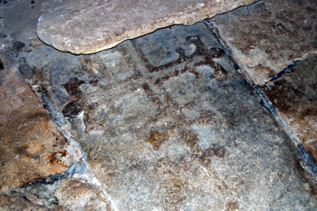 A medieval gravestone in Harrold church porch May 2008